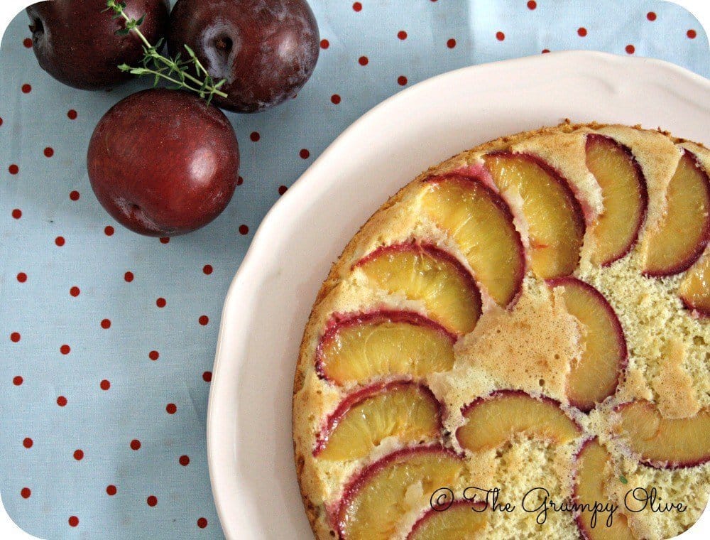 upside down plum cake with white chocolate, plums and a napkin