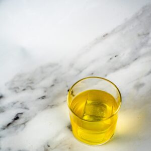 4 Ingredient Chai Cocktail, Delicious & Easy 2 spiked chai drink on a marble background