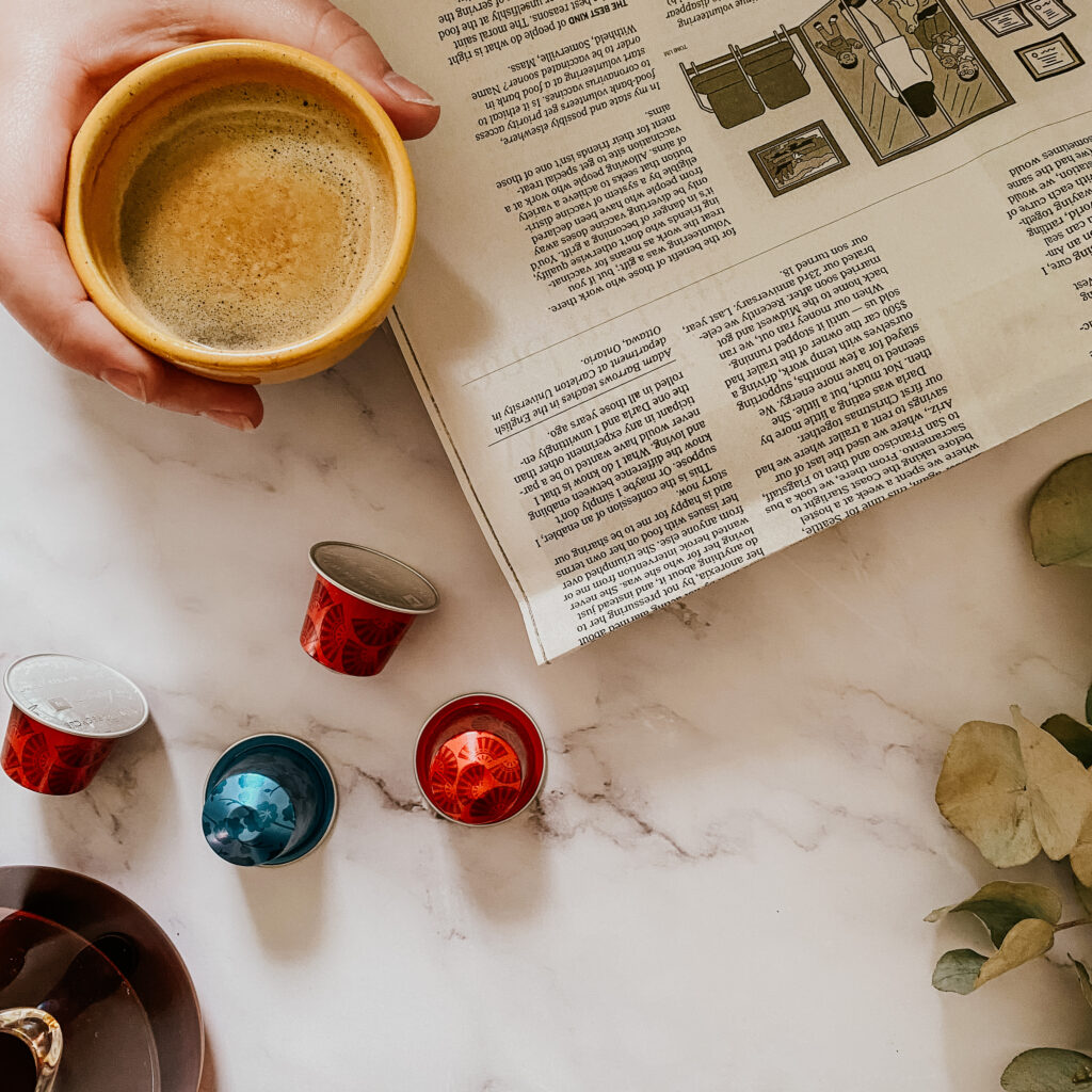 Unpopular Opinion: Let’s Talk About Coffee Pods 2 Drinking an espresso made from coffee pods