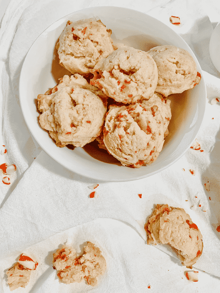peppermint cookies, on a white napkin and more cookies broken on the side