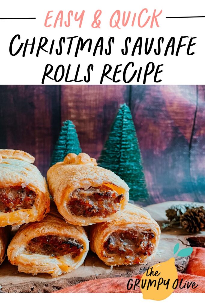 Christmas Sausage Rolls - Festive Appetizer Recipe 7 pin image - christmas sausage rolls on a wooden board, over a red towel, in the background a wooden back, pine cones and little christmas trees