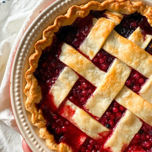 Delicious Bourbon & Mixed Berries Pie, #1 Christmas Dessert 5 mixed berries pie on a towel, over a marble background
