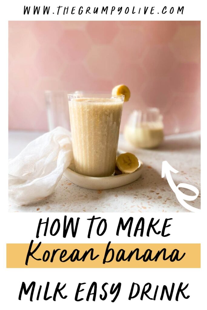 Easy Korean Banana Milk Recipe - Super Creamy 바나나 우유 8 banana milk on a marble board, a jug of milk behind and a white towel on the side - pin image