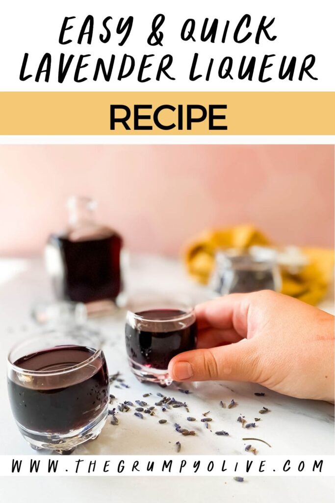 Lavender Liqueur Recipe - How To Make Delicious Lavande Liqueurs 7 Lavender liqueur bottle and shot glasses, one of which is being grabbed by a hand, with some dried lavender buds scattered around and a jar of lavender at the back with a yellow napkin with writing on top