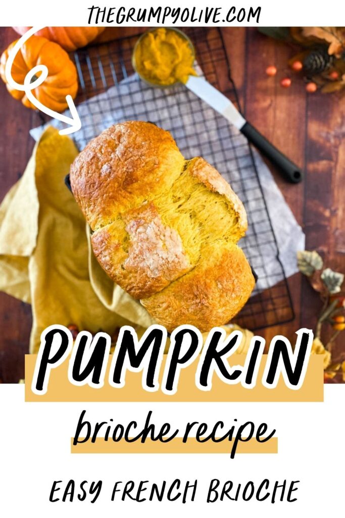 Easy Pumpkin Brioche Recipe - Fall Breakfast Staple 9 pumpkin brioche on a yellow towel, on a wire rack, wood background