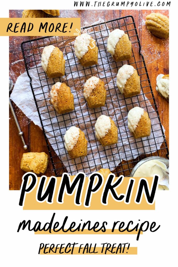 Delicious Pumpkin Madeleines With White Chocolate 9 pumpkin madeleines on a cooling rack on a wooden background, more madeleines and sugar on sides