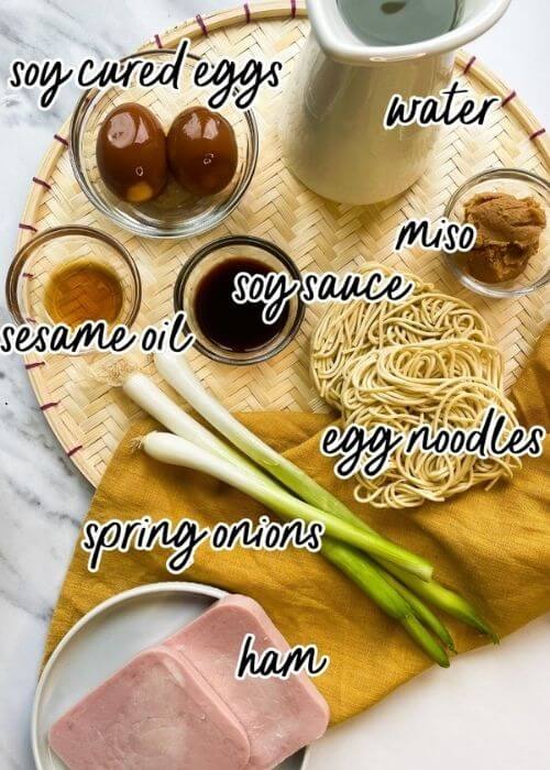 The Ponyo Ramen Recipe You Can't Miss Out On Because It's Delicious 2 image of ingredients for ponyo rame in bowls and a towel