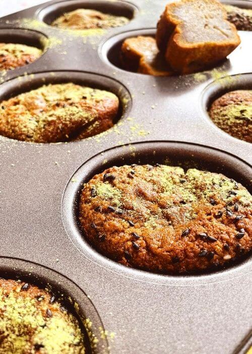 Delicious Matcha Mochi Muffins 4 close up matcha mochi muffins in a tin